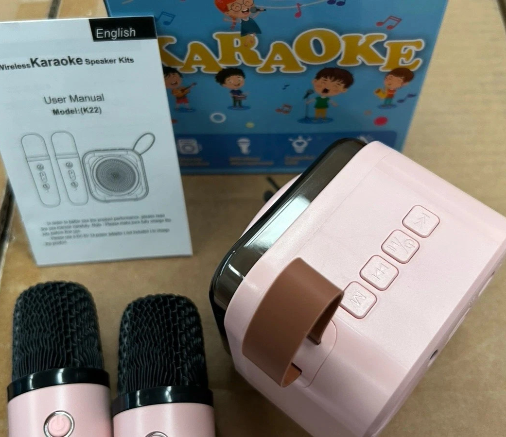 Karaoke Bambini 2 Microfoni Senza Fili Luci LED Cambio Voce Rosa USB 2600mAh 8cm